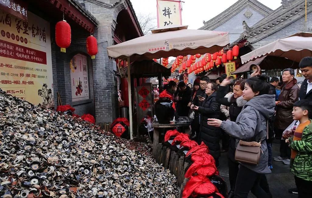 西安摔碗酒的地址在哪里，西安城墻腳下的永興坊